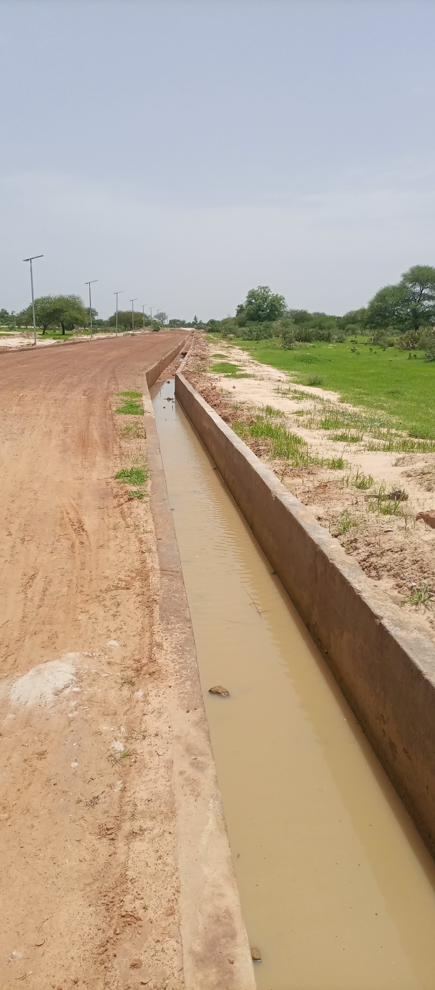 Construction Of Concrete Line Drain And Earthwork