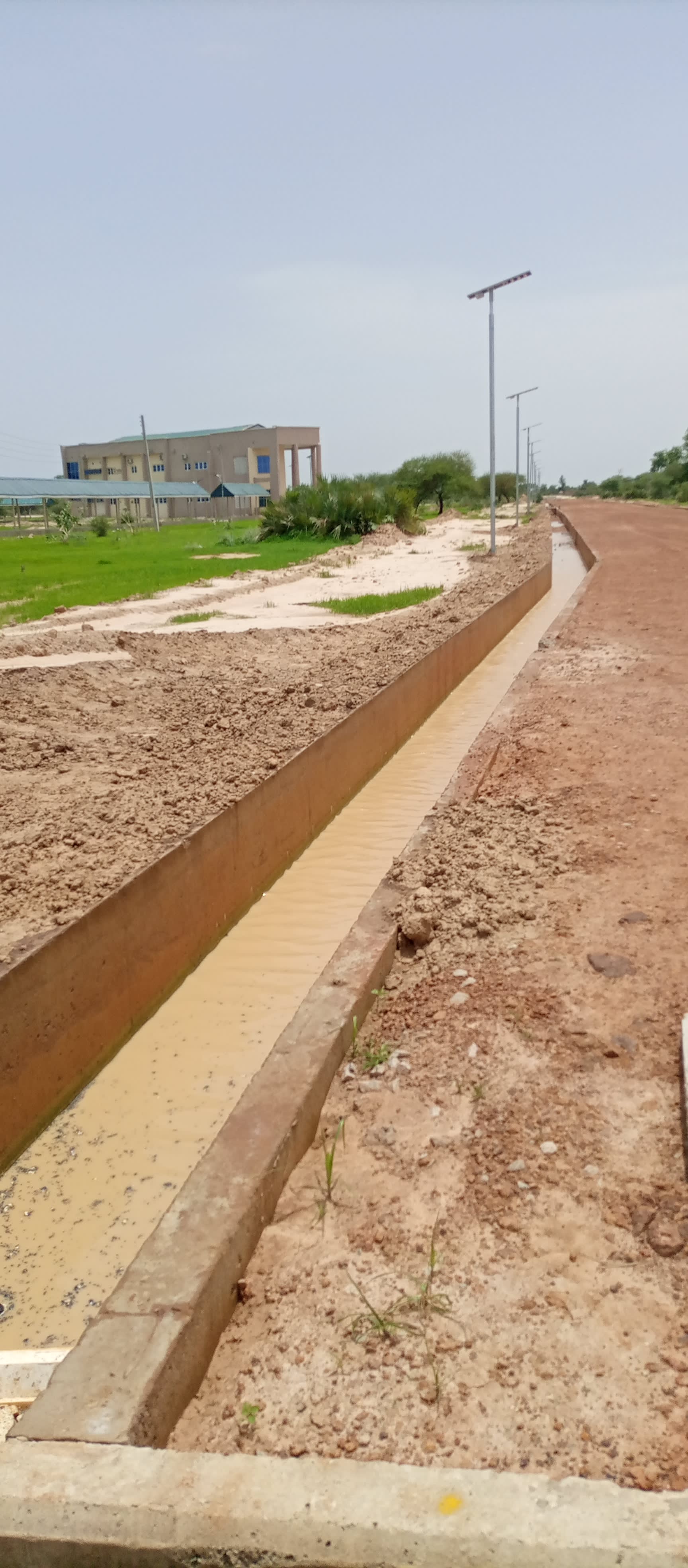 Construction Of Concrete Line Drain And Earthwork